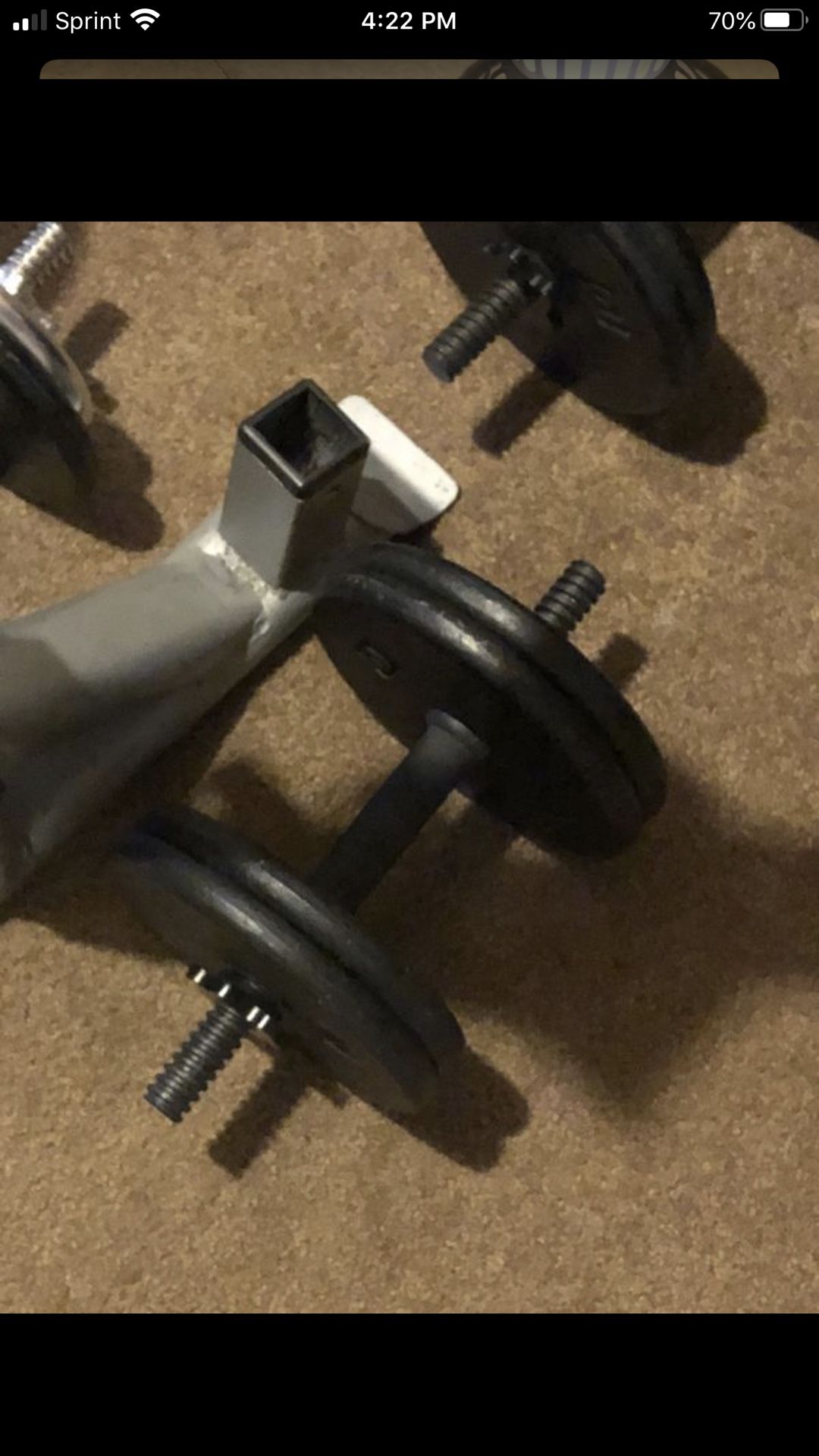 60lbs in plates with a curl bar and a dumbbell set
