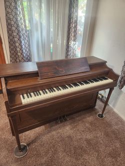 Howlett and davis vintage piano