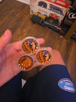 Veterans genuine gold coated memorabilia coin though, the inside is silver 50$ each