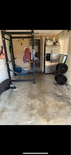 Rogue Rack, barbell and bumper plates