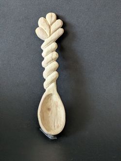 Hand carved honey wood spoon
