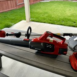 Jonsered 58 Volt Cordless Blower, String Trimmer, Li-Ion battery and charger