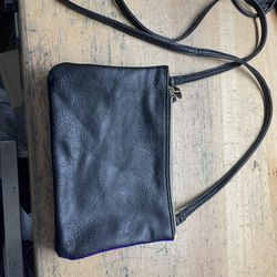 Mini woman’s handbag in black leather 