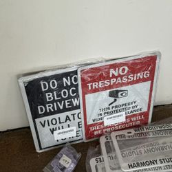 Signs- No Trespassing And Do Not Block Driveway