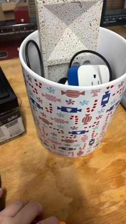 A  Vase With Chargers And A Small Tray