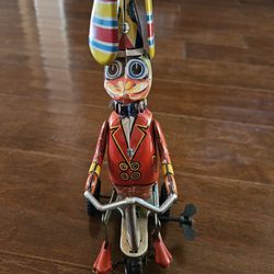 Vintage Metal Childs Windup Toy "Duck On Bike"