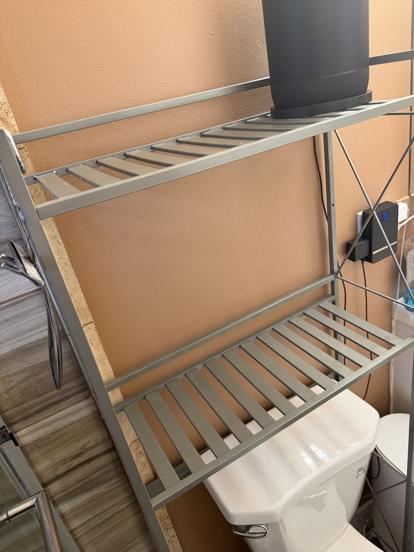 Bathroom over the toilet shelf