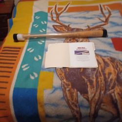 Sign Willie may's bat.\nWith papers