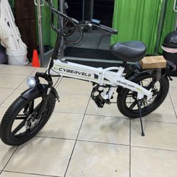 CYBERVELO FOLDING E. BIKE PEAK 1000W 48V 20.8AhLARGE REMOVABLE BATTERY +30MPH-RANGE 80MILES. —PAYLOAD CAP. 350 LBS. —TIRES 20  x 3 in  FEATURES AT A G
