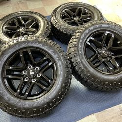 (4) 18” CHEVY SILVERADO TRAILBOSS BLACK FACTORY WHEELS & GOODYEAR WRANGLER DURATRAC LT275/65R18