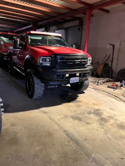 2003 Lifted Red Ford F-350 Super Duty Truck