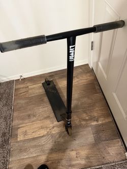 LMT pro scooter. Black. Transparent wheels. & handle bar grips.