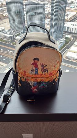 Loungefly Disney Pixar Coco “Remember Me” Mini Backpack