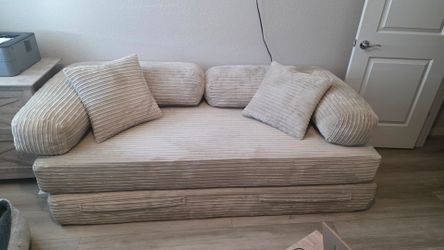 Beige Corduroy Loveseat with Pillows