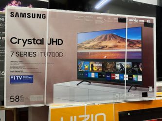 58" screen led smart 4k ultra HDTV by Samsung crystal.  1 year warranty