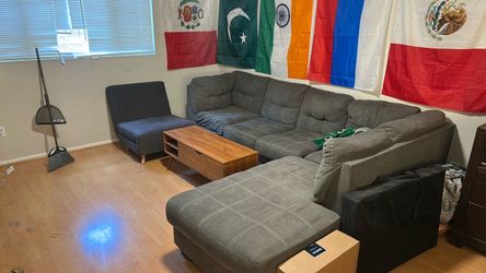 L-couch with foldable cushioned chair
