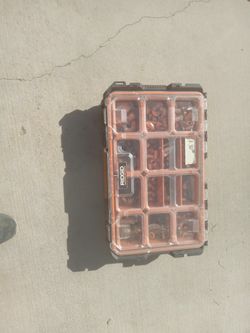 Rigid box with supplies
