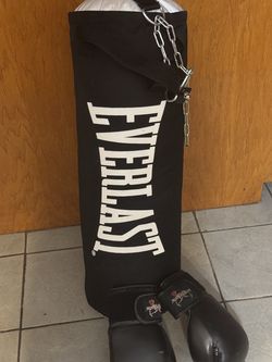 70 lb poly heavy bag with a pair of gloves