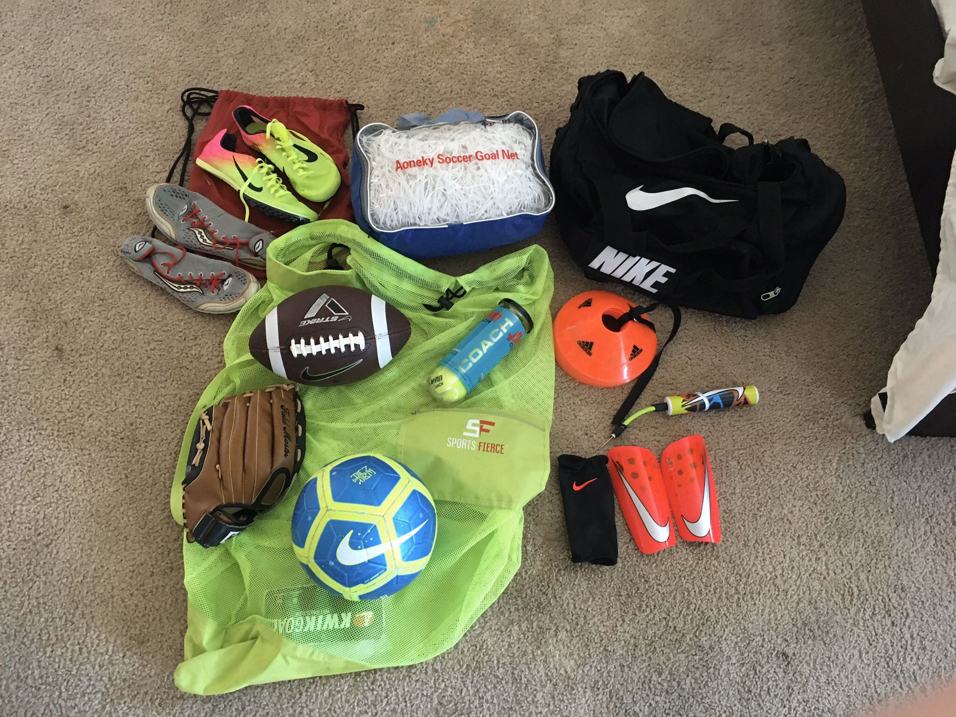 Football , Soccer Goal Net ($100 New) , Track spikes (sz10), baseball glove