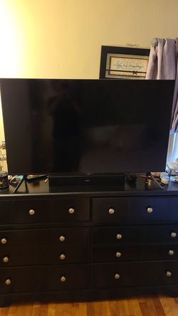 Samsung TV 55 inches and a bose speaker.