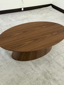 Oval Wood Coffee Table with Pedestal Base