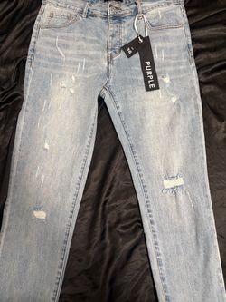 Purple jeans black tag