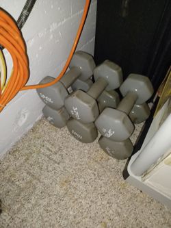 15lb rubber dumbells. 3 sets avail. 25. Ea. set