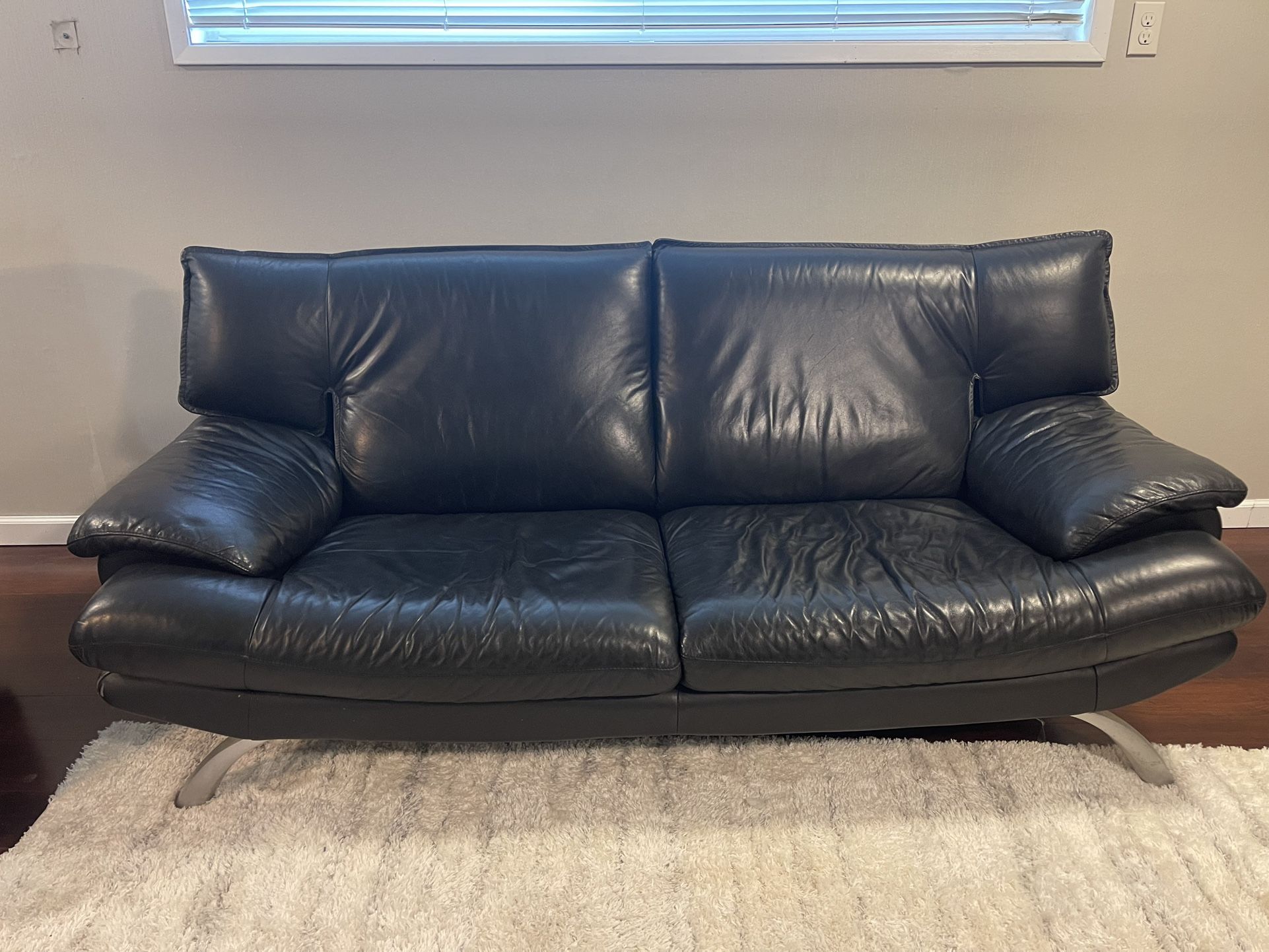 Leather couch and coffee table