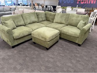 Sage green comfy sectional couch with ottoman