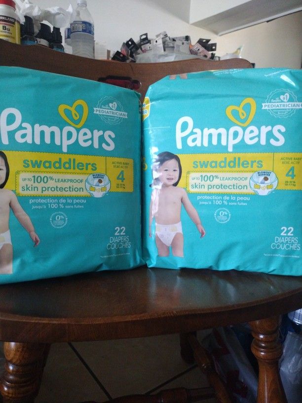 Dos Bolsas De Pamper Por $16