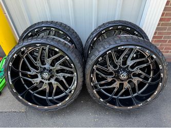 NEW 26x12 TIS wheels wrapped in RBP RT tires. 305/30r26 same as a 33.