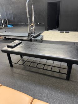 Black Padded Massage Table with Storage Shelf