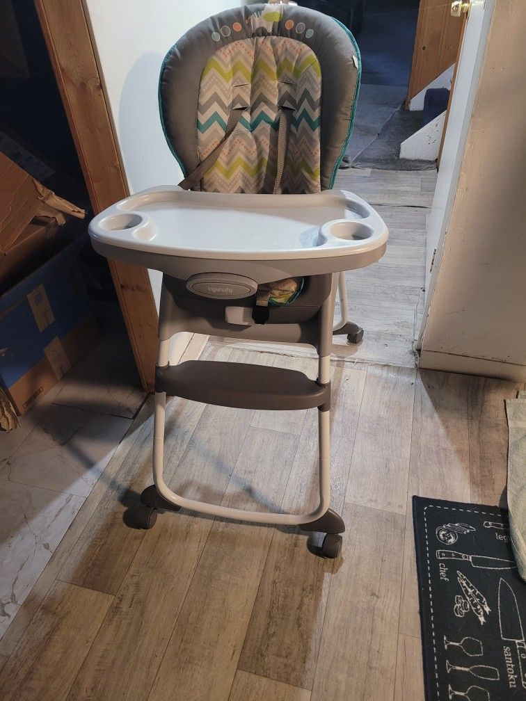 Fairly New Adjustable High Chair