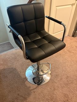 2 Black and Silver Adjustable Bar Stools