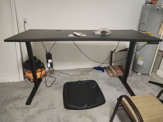 Black adjustable Desk.