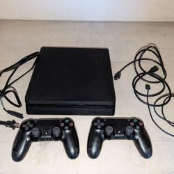 PS4 + 2 Wireless Controllers 
