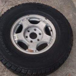 Brand New Tire On Chevy Truck Rim Size 265/75R16