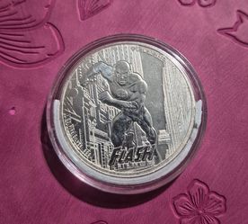Silver coin with Flash