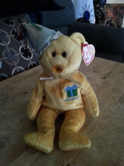 Yellow November beanie baby bear