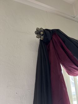 Brass curtain rod with curtains