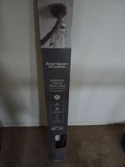 New in box  curved shower rod