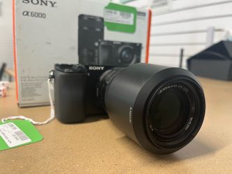 Sony A6000 digital camera with 16-50 mm lens and 55-210mm