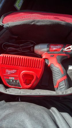 Impact drill battery and charger