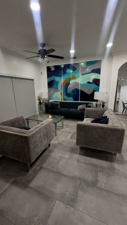 Living room set and glass table and 2 night stands.