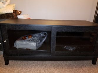 BLACK T.V. STAND &GLASS SLIDING DOORS