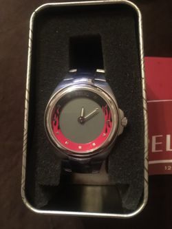Relic men's watch with red and black flames.