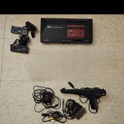 Sega Master System Console,  2 Games, 2 Controllers, 1 Light Phaser Gun. 