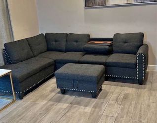 Charcoal linen sectional couch and ottoman