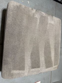 Grey storage ottoman