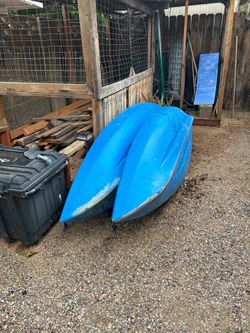 Pair of kayaks with rolling carriers